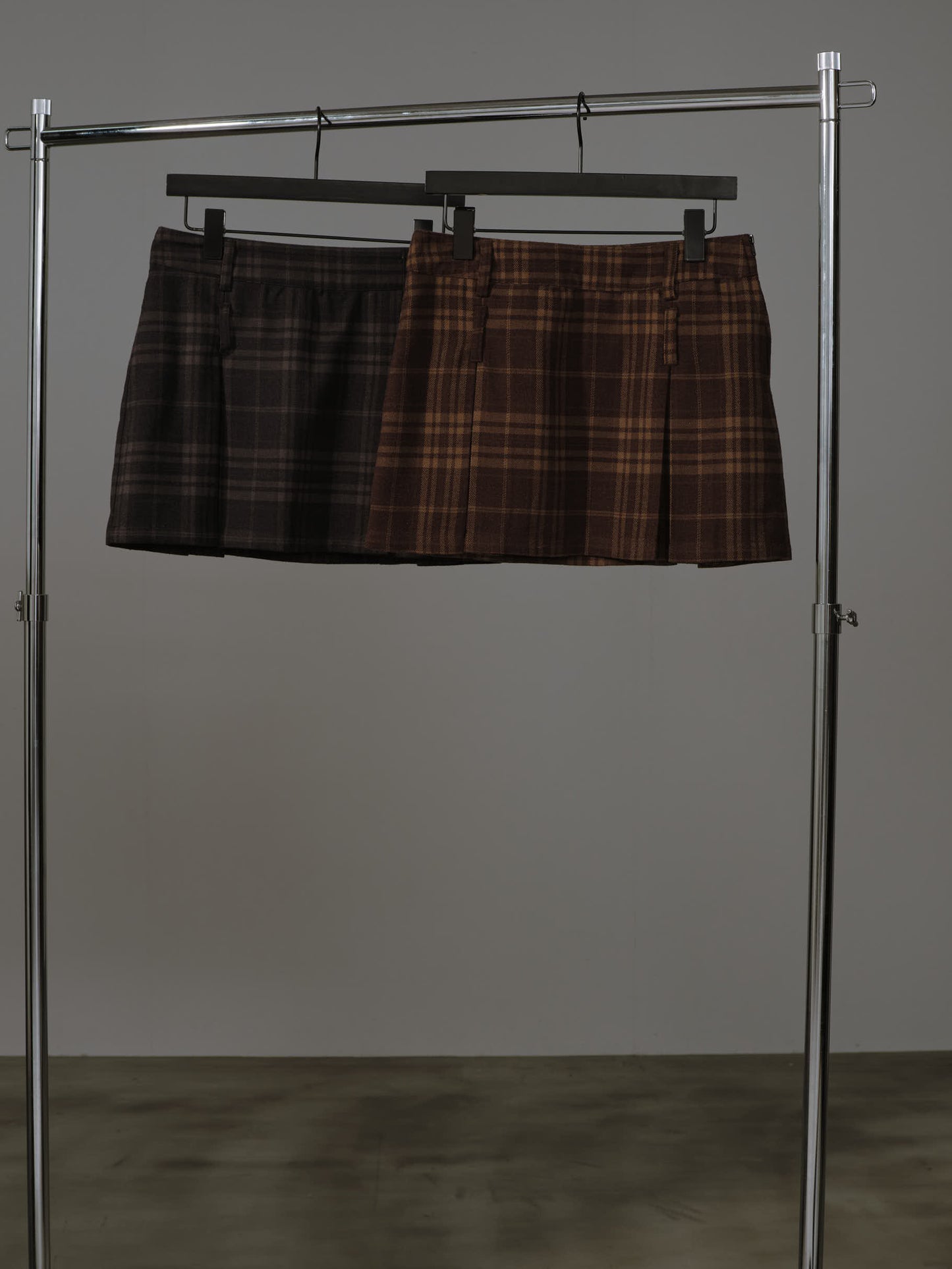 PLEATED CHECK MINI SKIRT